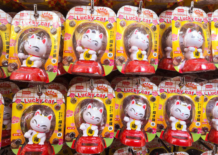6. The Solar-Powered White Lucky Cat -- Be Soothed By 6. Its Charming Gesture! Summon Good Luck With This Solar-Powered White Lucky Cat